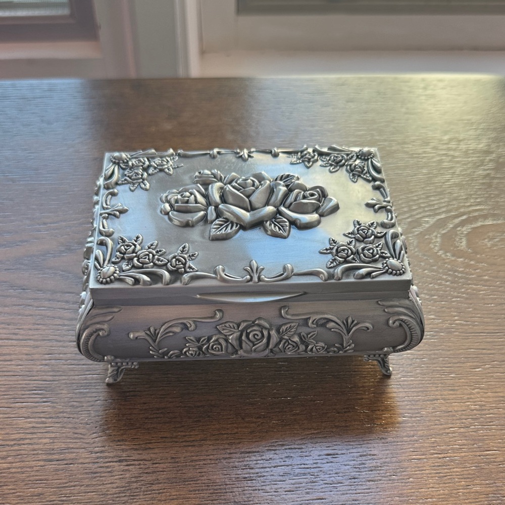 Ornate Silver Jewelry Box with Rose Motif
